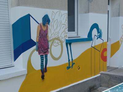 Adey stencils - collective mural at the Fleury leisure centre — Street art in Fleury-sur-Orne