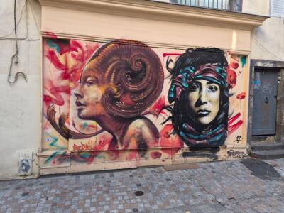 Deux visages par Apogé et Repy One — Street art de Repy One, Apogé (Olivier Robillard) à Clermont-Ferrand