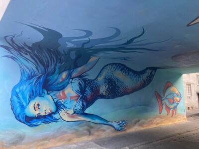 Syrena, the Mermaid in the Passage — Street art by Taki Myk in Warsaw