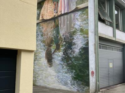 Flying Bridges Are Being Built Everywhere — Street art by Rouge in Le Locle