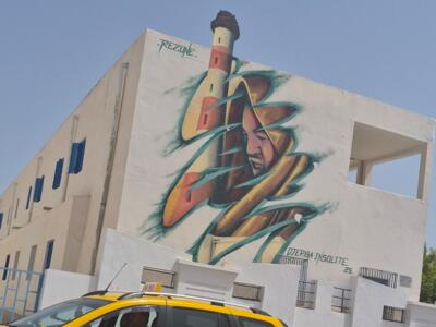 The old man and the lighthouse by Rezone — Street art by Rezone in Djerba Midun