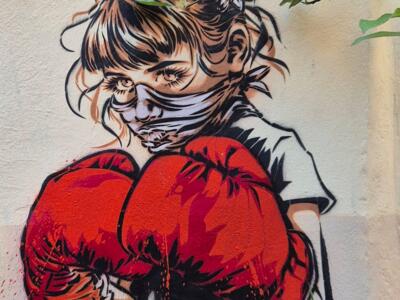 Little girl in boxing gloves — Street art by RNST in Marseille