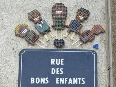 The Row of Good Children — Street art by Mifamosa in Orléans