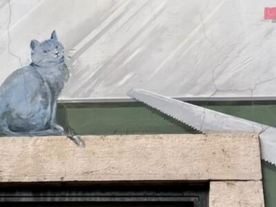 Le Chat et la Scie — Street art by Carolus in La Chaux-de-Fonds