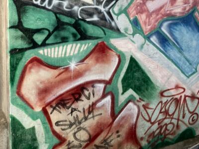 Pink wildstyle and spray can head — Street art in La Chaux-de-Fonds