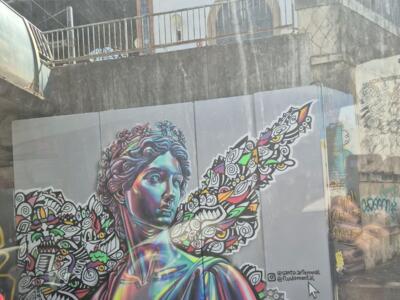 Classical Bust with Coloured Wings — Street art by Fluidomental, Santo Arte Mural in Jerez de la Frontera