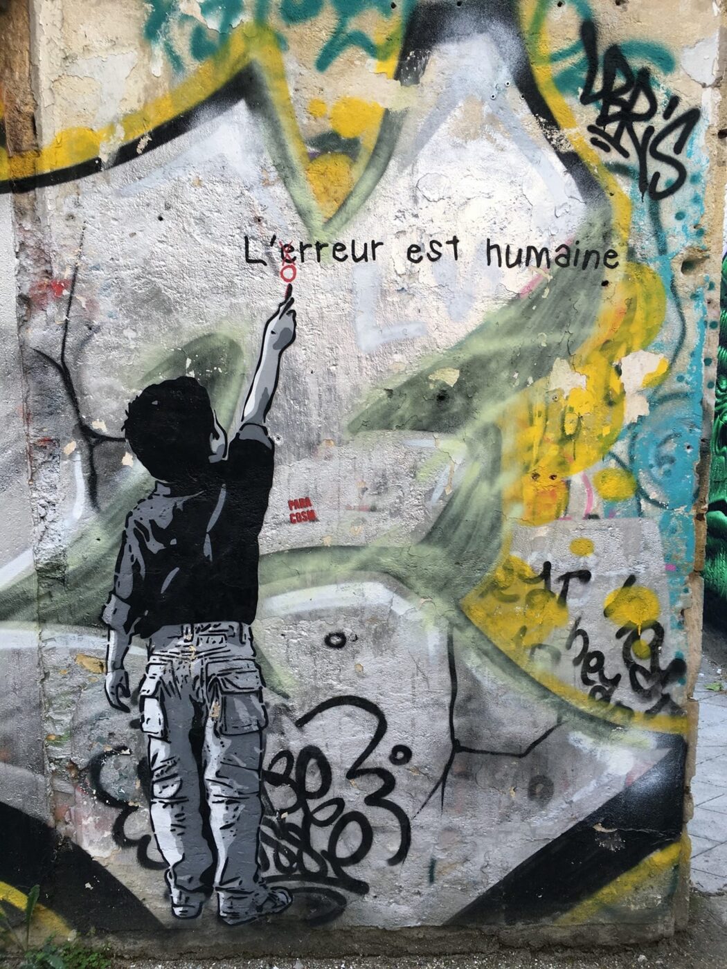 "To err is human", a stencil signed Paracosm, southern building.