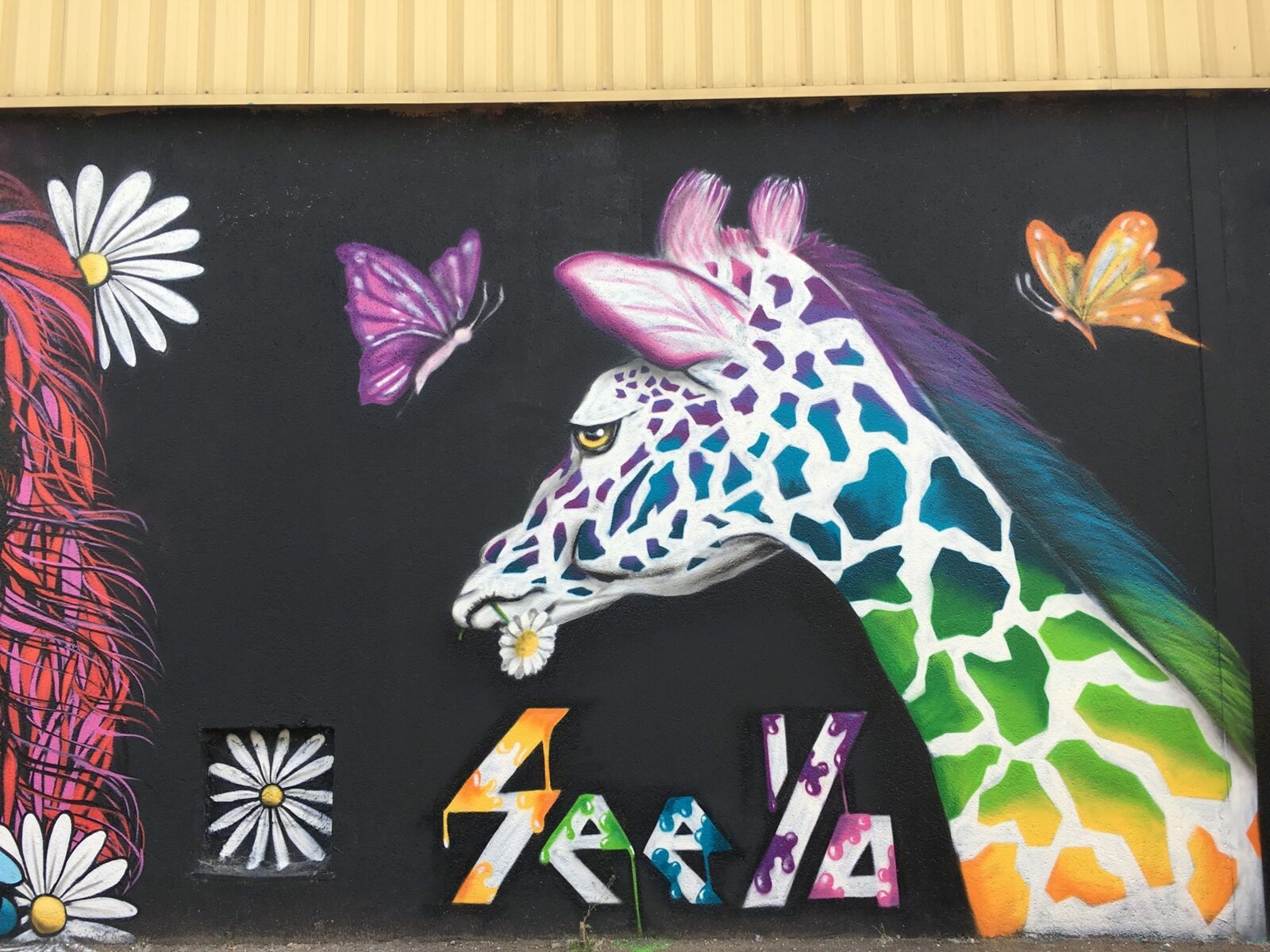 Rainbow giraffe by See Ya, quai des Queyries.