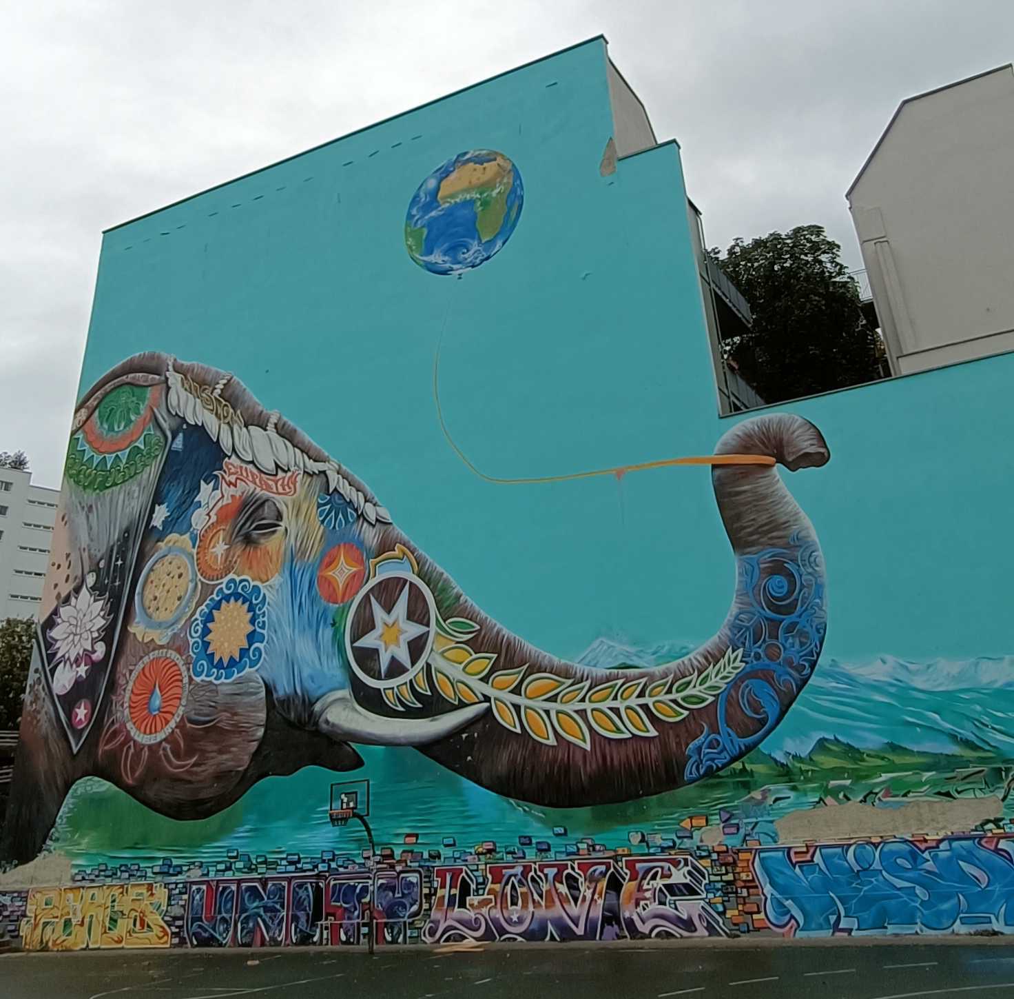 Giant turquoise-brown elephant with compl… — Berlin, Germany