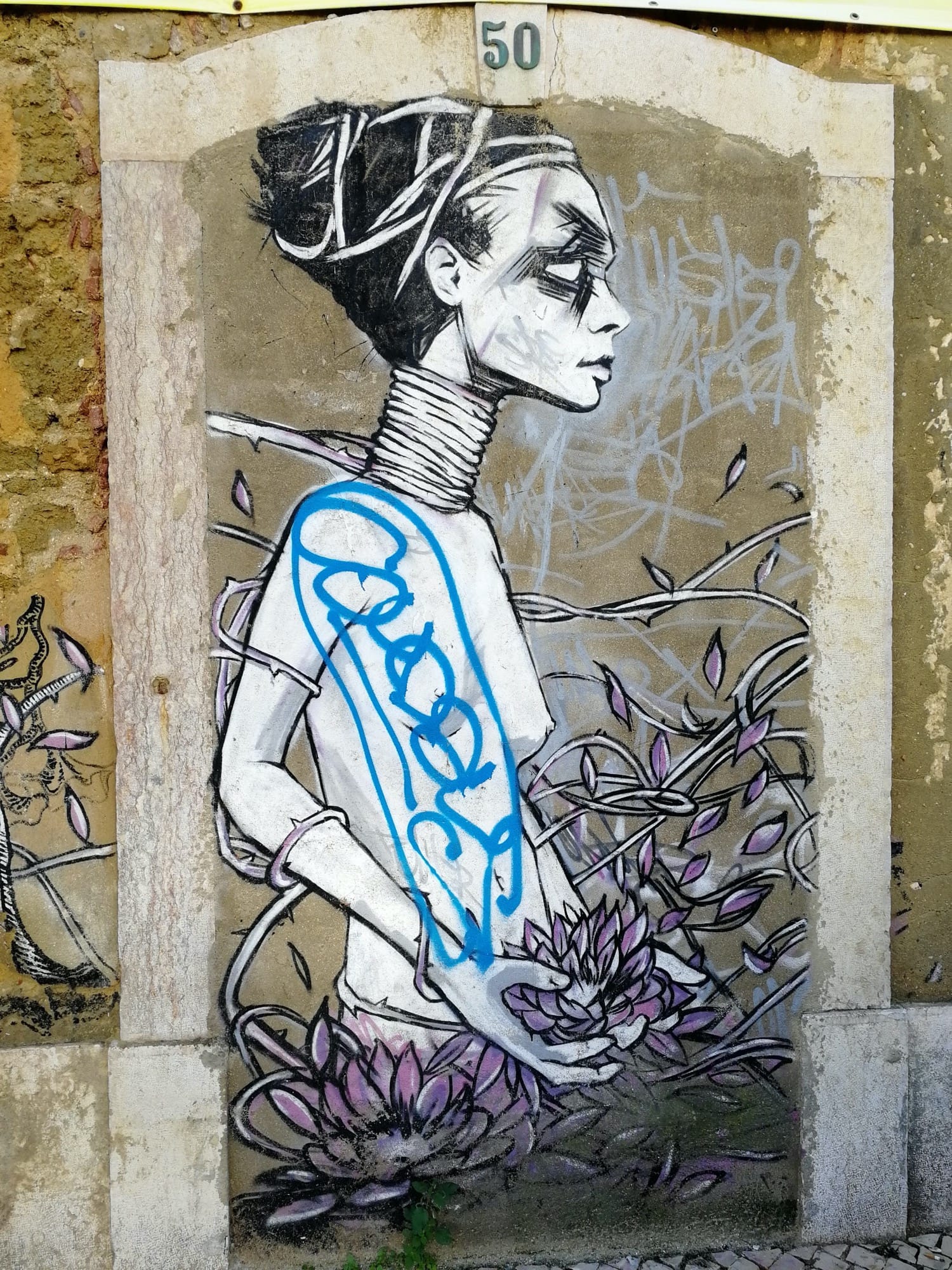 Graffiti 1099  capturé par Rabot à Lisboa Portugal