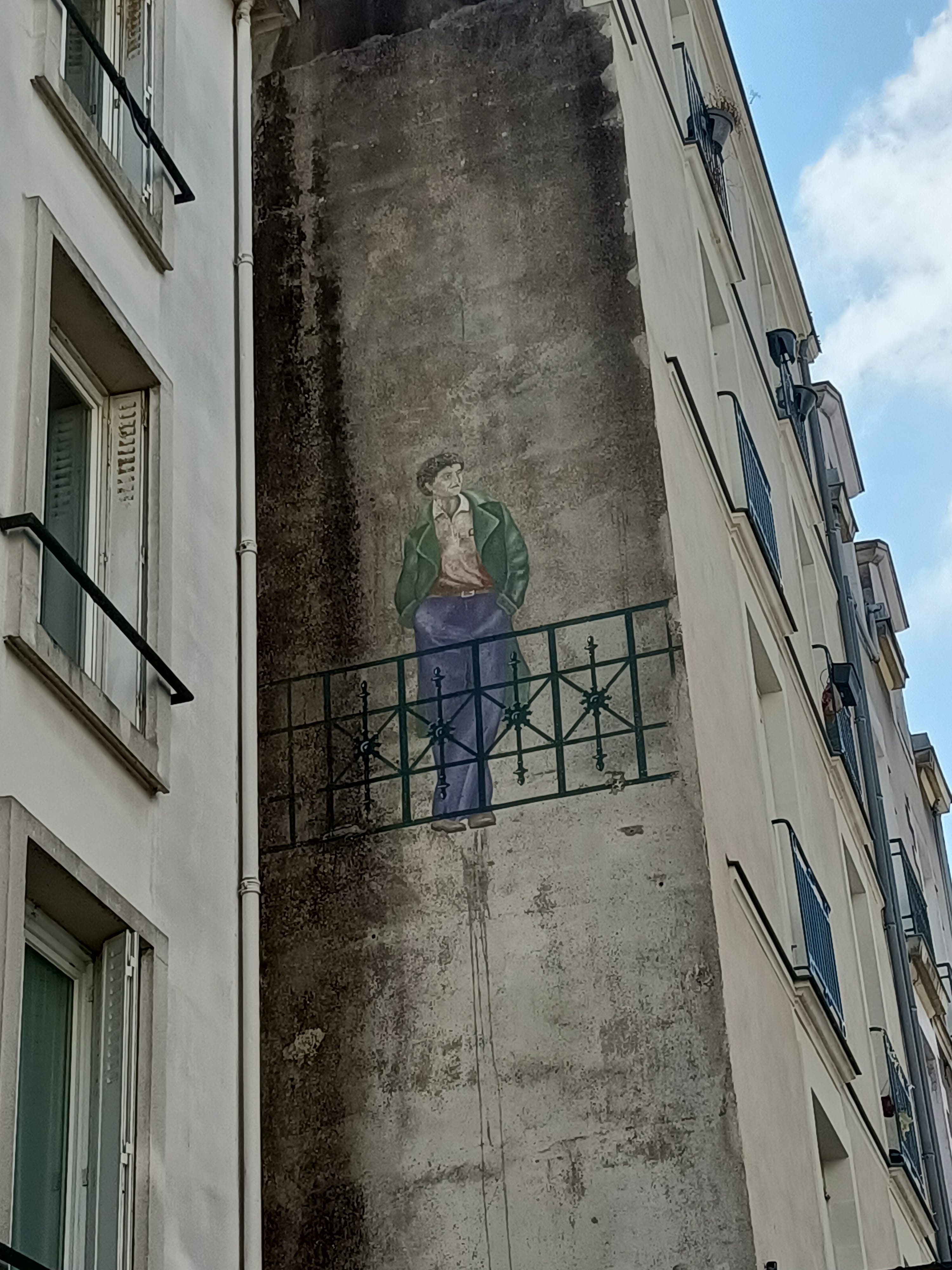 Graffiti 5188 Homme au balcon captured by Rabot in Nantes France