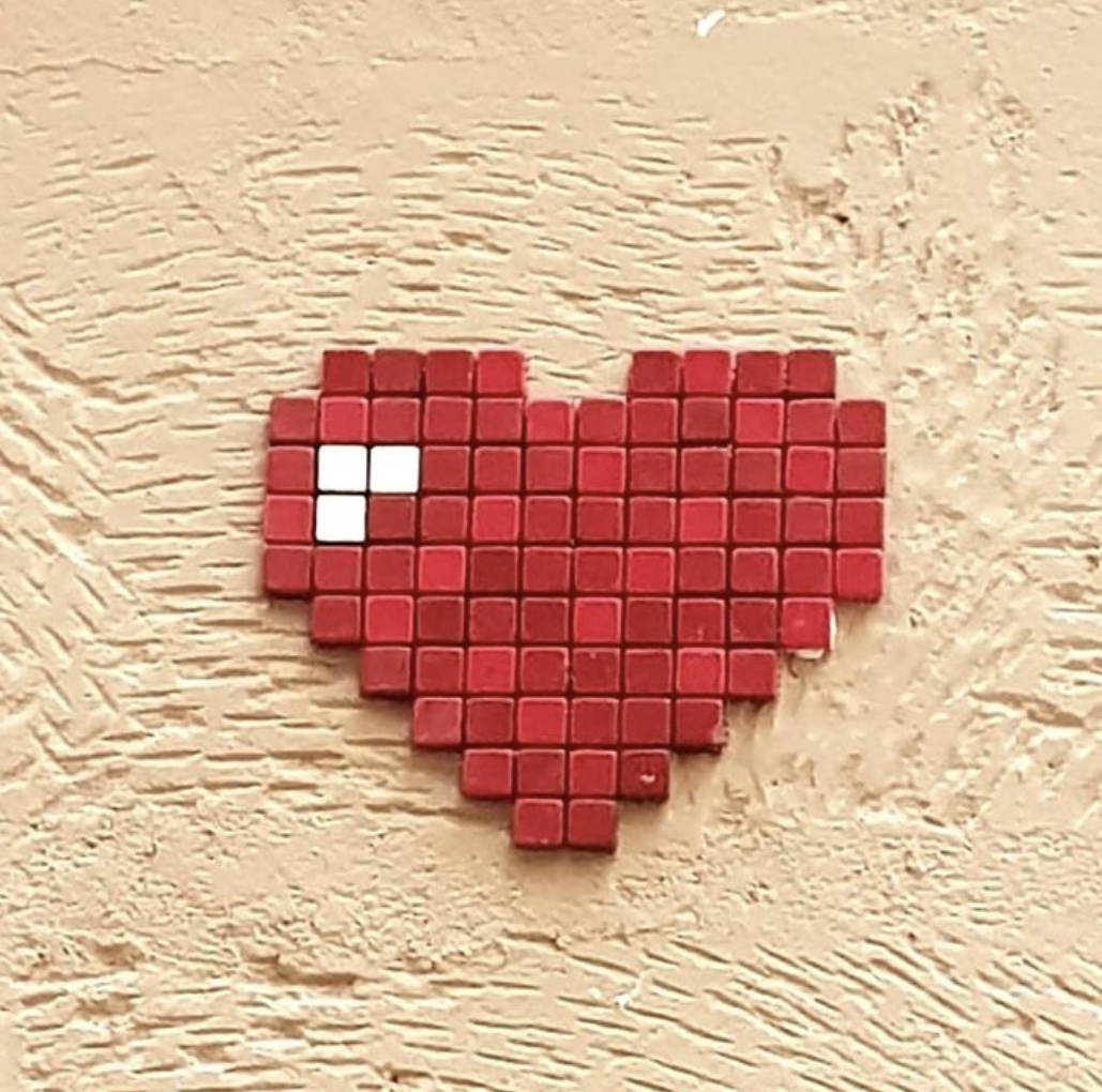 Sticking 5344 Street heart by the artist Coeur pixel in Paris France
