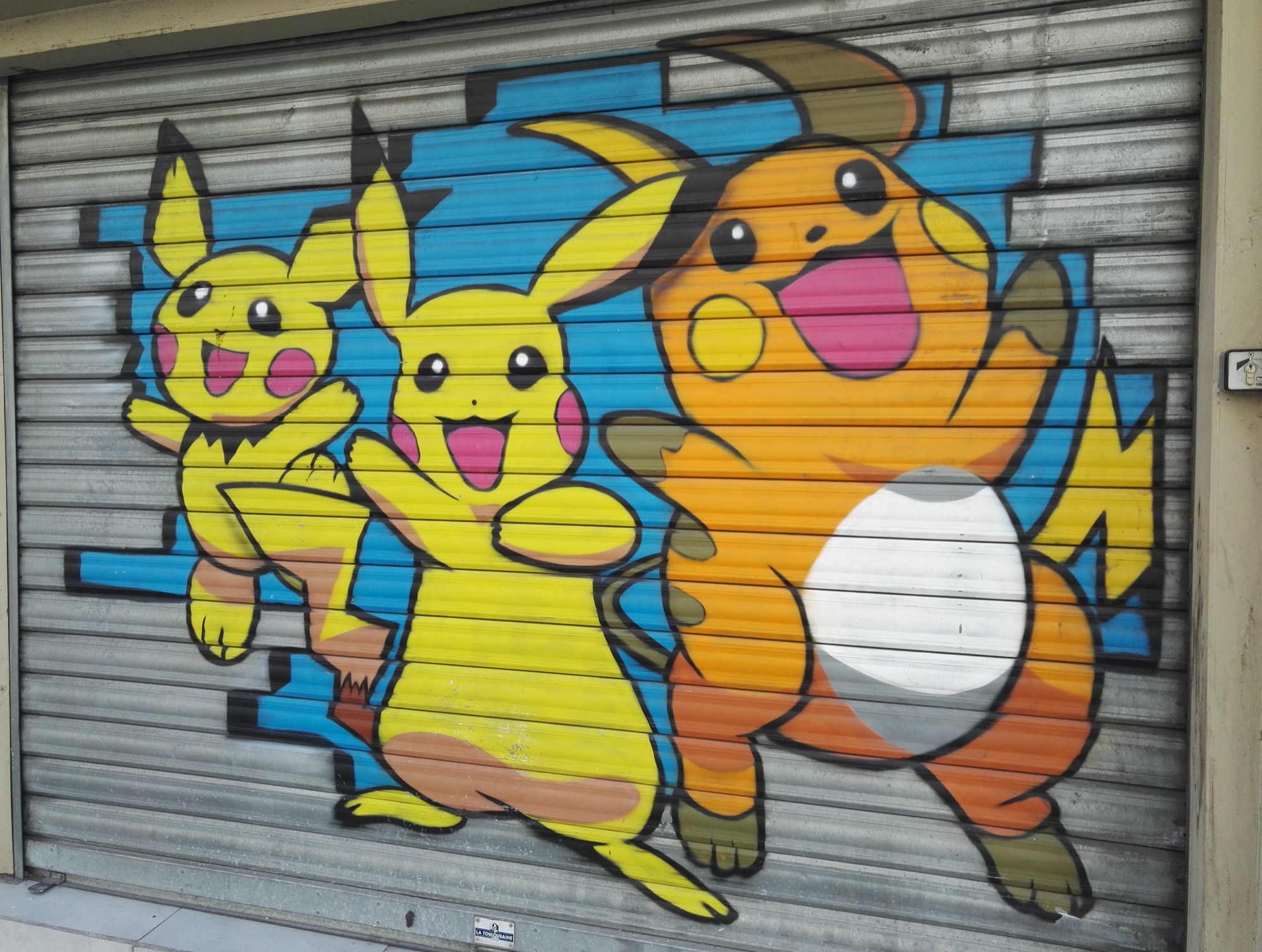 Graffiti 98 Pikachu family captured by Rabot in Bourges France